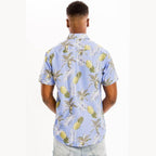 Men's light blue vacation shirt with a tropical pineapple and palm leaf pattern
