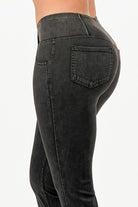 Stylish lightweight flare jeans for women in black with a flattering fit and back pockets