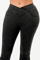 Black lightweight flare jeans for women with a flattering cross waistband design