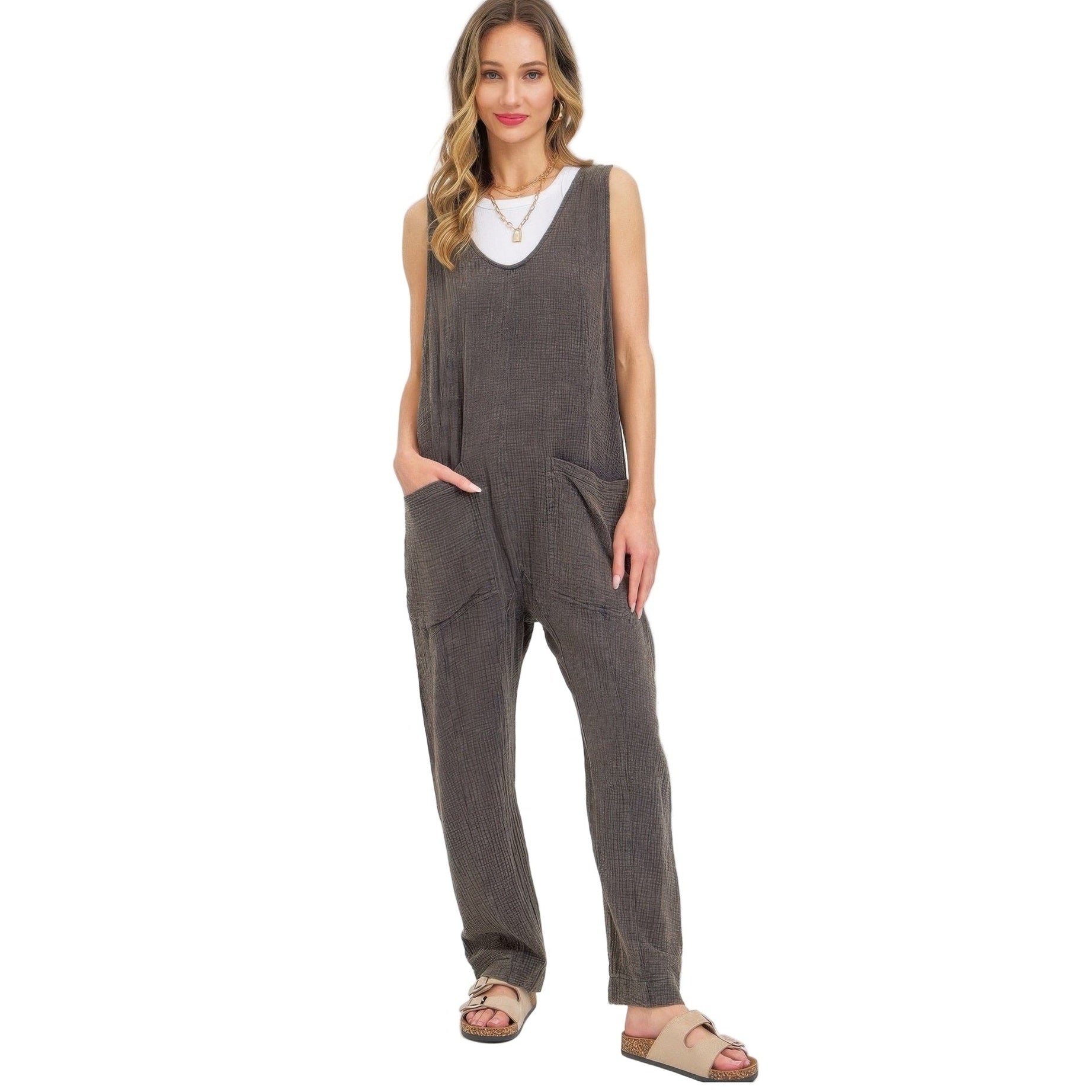 Lightweight travel jumpsuit for women in gray with pockets, perfect for summer adventures