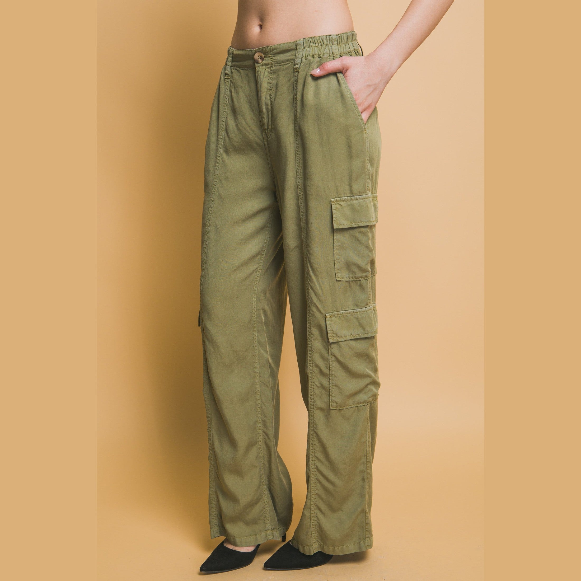 VacationGrabs women's olive green lightweight travel pants with pockets and cargo style design