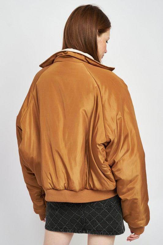 Emory Park lightweight travel puffer coat in brown with a relaxed fit and stylish design
