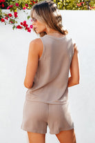 Lightweight womens loungewear set in beige ribbed fabric featuring a sleeveless top and matching shorts