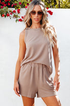Lightweight womens loungewear set by YNIQUE featuring a sleeveless ribbed tank top and matching shorts in beige
