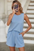 Lightweight womens loungewear set in blue striped sleeveless top and matching shorts with pockets