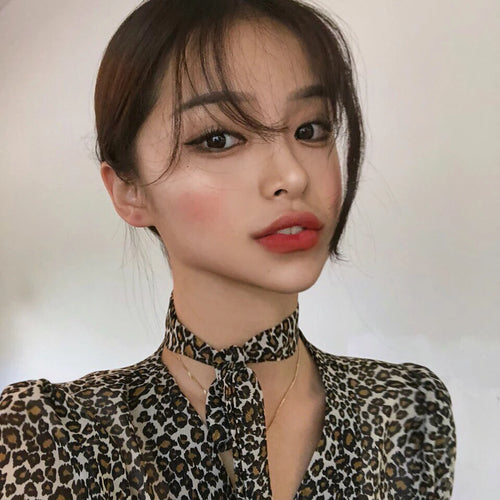Model showing lips with lip liner in a natural makeup look