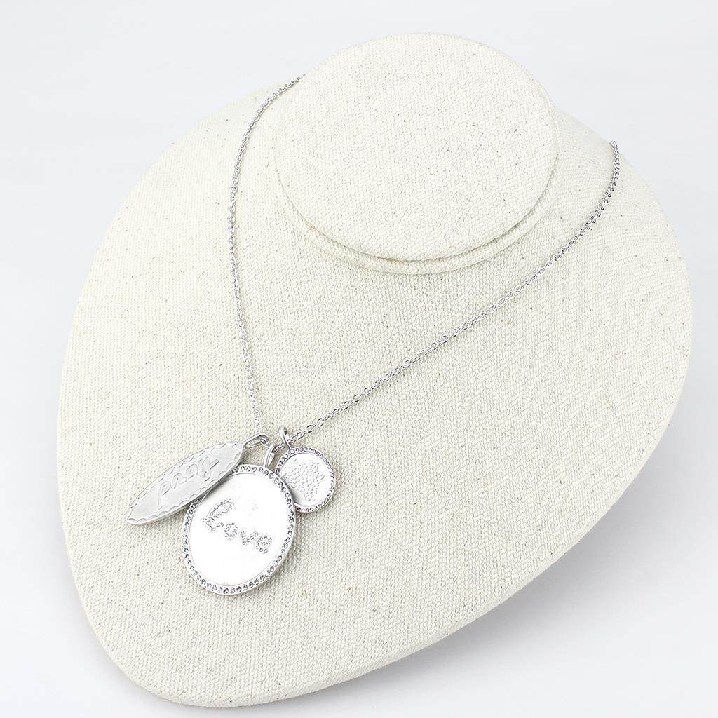 Rhodium brushed brass necklace featuring circular pendants with love inscription for stylish women