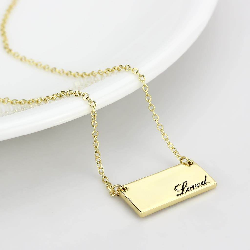 VacationGrabs flash gold brass necklace featuring a pendant with the word Loved engraved