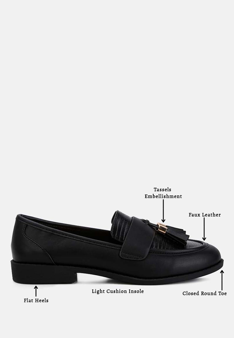 Women's black faux leather loafers with tassel embellishment and flat heels