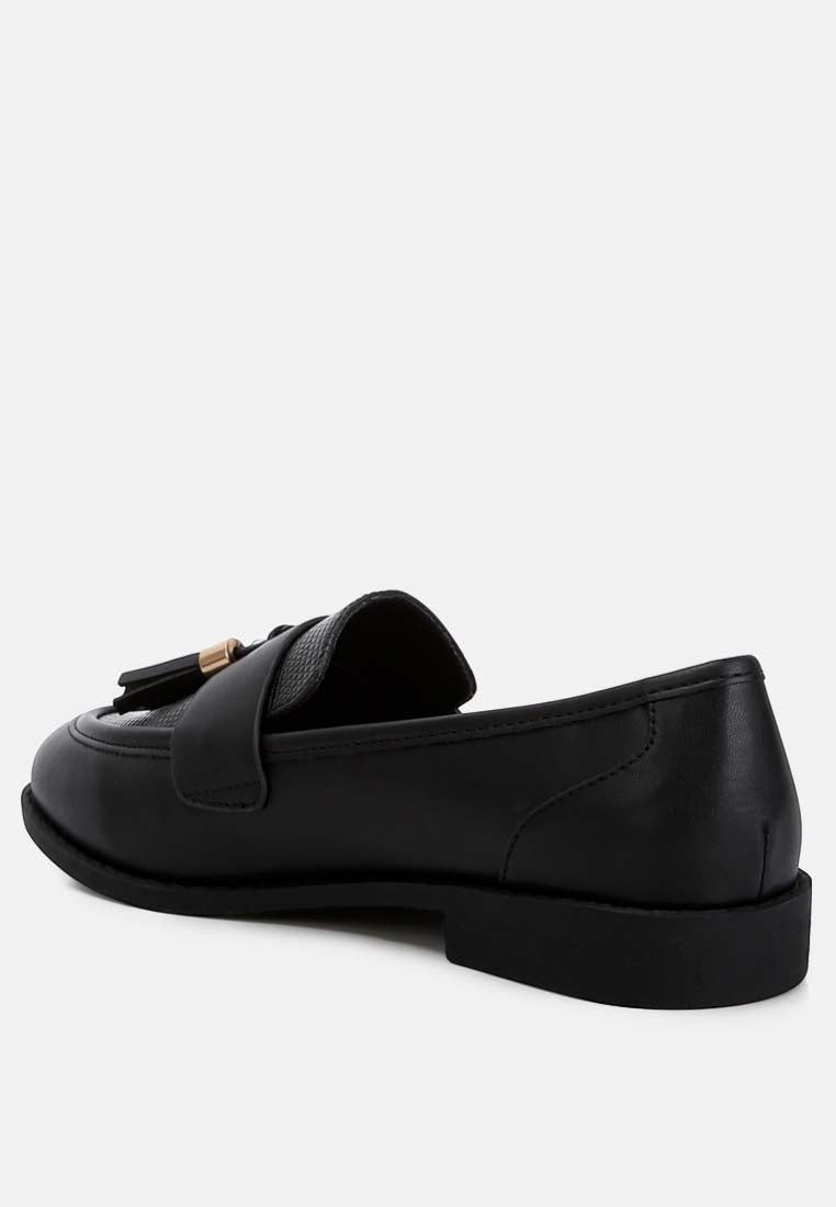 Women's black leather loafers with decorative tassels for casual wear