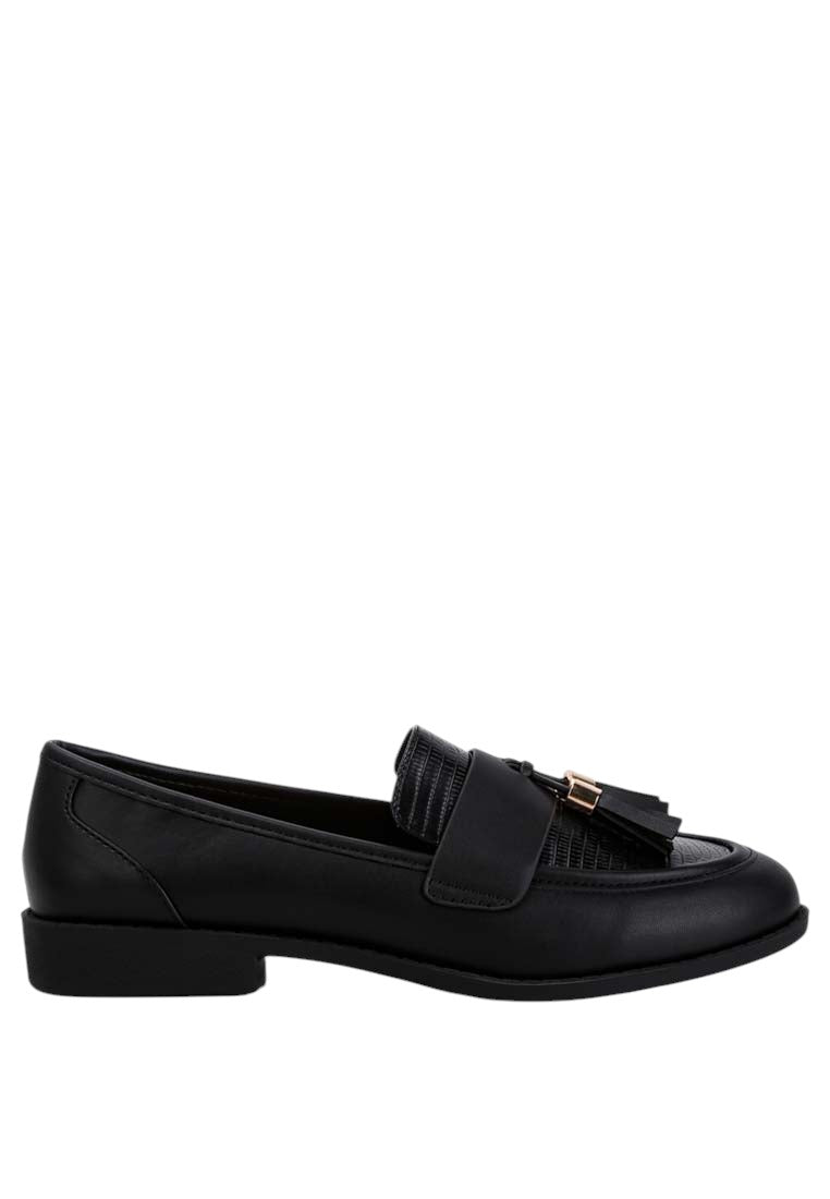 Women's black leather loafers with tassel detail for everyday wear