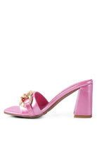 Stylish pink block heel sandals for women with a decorative buckle accent