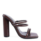Stylish women's dandelion croc sandals with crocodile texture and chunky heels for trendy summer outfits