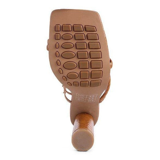 Sole of Rag Company dandelion croc sandals showing textured grip for comfort and stability