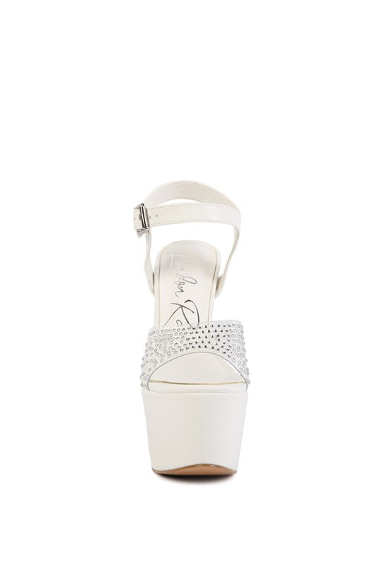 Women's clear ultra high heel sandals with rhinestone detailing in white