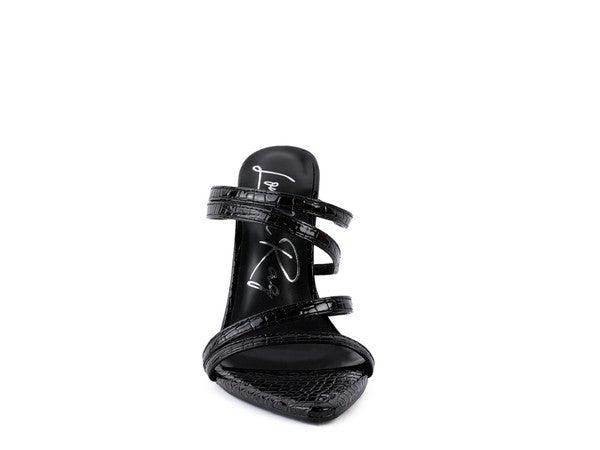 Stylish croc metal high heels for women with sleek straps and a pointed toe design.
