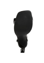 Black women's heeled sandals with bow, ideal for stylish outings