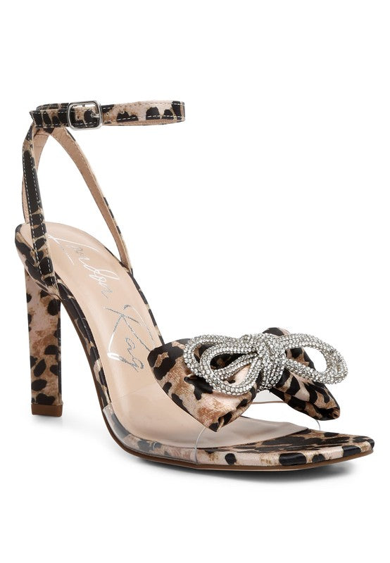 Women's heeled sandals with bow in leopard print and clear strap
