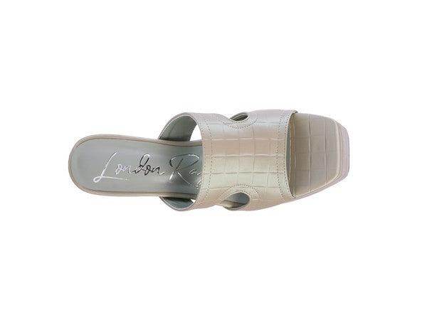 Rag Company women's heels in beige featuring a stylish design, perfect for stylish vacation footwear.
