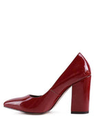 Stylish red heels with a pointed toe design, perfect for pairing with elegant black pumps for women