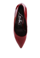 Stylish red pointed-toe pumps for women, perfect for pairing with elegant outfits