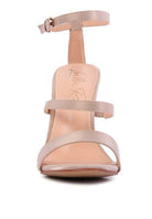 Beige satin ball heel shoes with ankle strap and minimalist design for stylish women