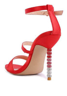 Stunning red satin ball heel shoes with sparkling rhinestone details on the heel