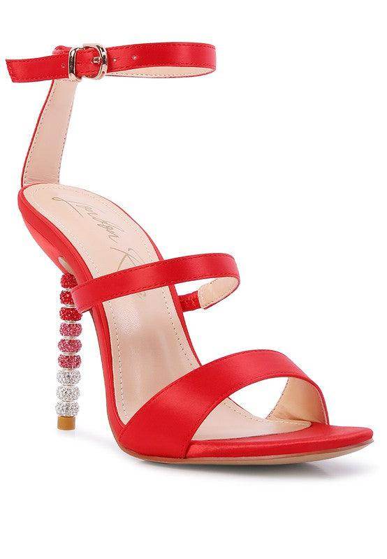 Stylish red satin ball heel shoes with ankle straps and decorative beaded heels for women's fashion