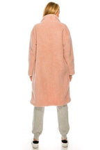 Back view of a long pink fleece coat for women, perfect for cozy winter layering by Andante USA