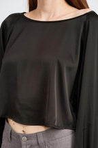 Emory Park long sleeve satin top in black with a relaxed fit and soft sheen for elegant style