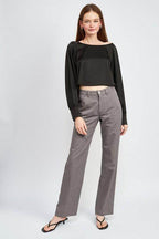 Emory Park Women's Long Sleeve Satin Top in Black Styled with Gray Trousers for a Chic Look