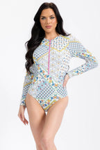 Women's long sleeve swimsuit in colorful floral print for beach outings