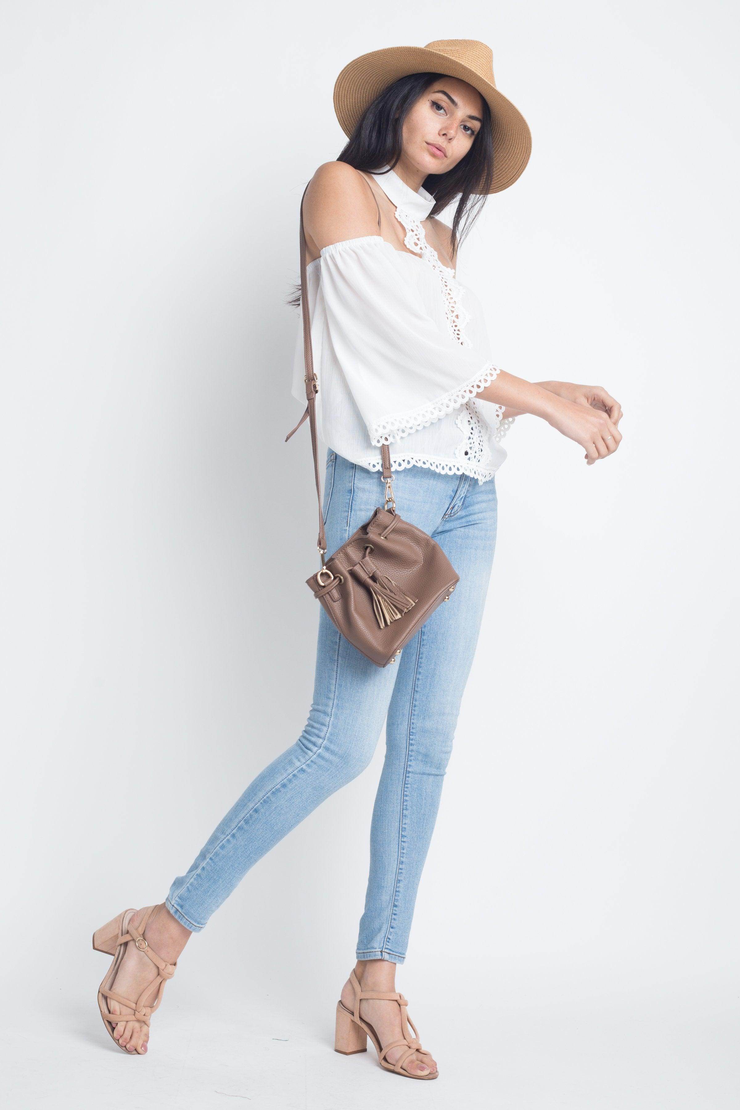 Ivory Felix long sleeve vacation top with lace detailing, perfect for stylish summer outings