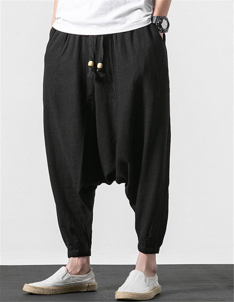 Loose fit mens vacation pants in black with adjustable drawstring for comfortable wear