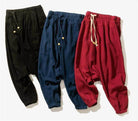 Loose fit mens vacation pants in black, navy, and red with comfortable drawstring waist