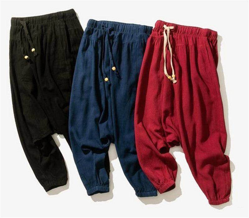 Loose fit mens vacation pants in black, navy, and red with comfortable drawstring waist
