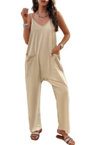 Loose sleeveless jumpsuit for women in beige with side pockets, perfect for summer outings