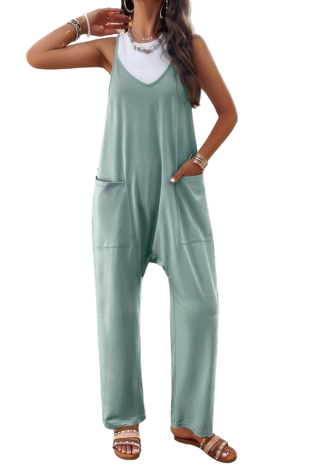Loose sleeveless jumpsuit for women in teal with pockets and relaxed fit for casual outings