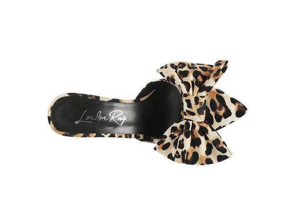 Stylish bow tie high heel shoes in leopard print, perfect for adding flair to any outfit
