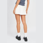 Emory Park Women's low rise skort shorts with pleated design in white for a stylish look