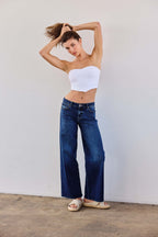 Women's low waist jeans in dark blue denim, casual and stylish