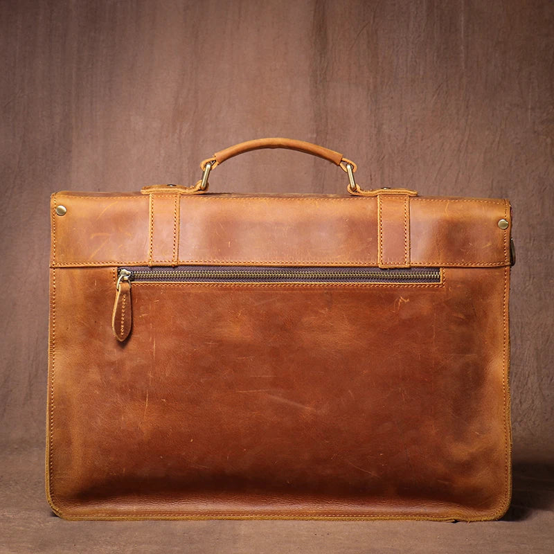 Brown leather laptop and bag for stylish professionals