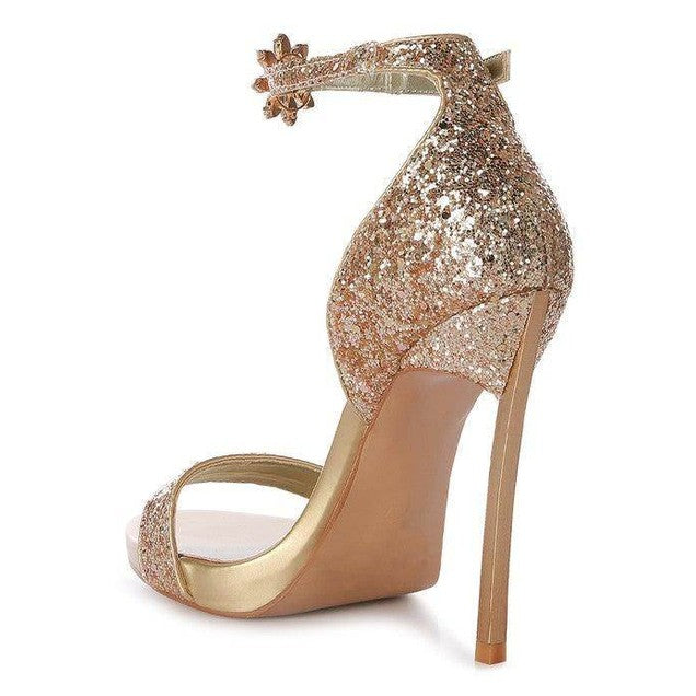 Stylish luxury black high heels with sparkling glitter accents and ankle strap for elegant occasions