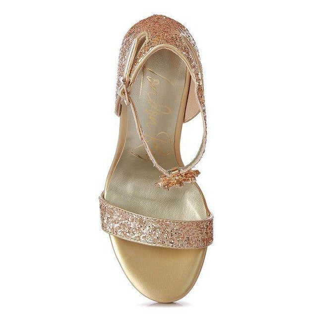 Elegant gold women's shoes adorned with sequins, perfect for evening wear and special occasions