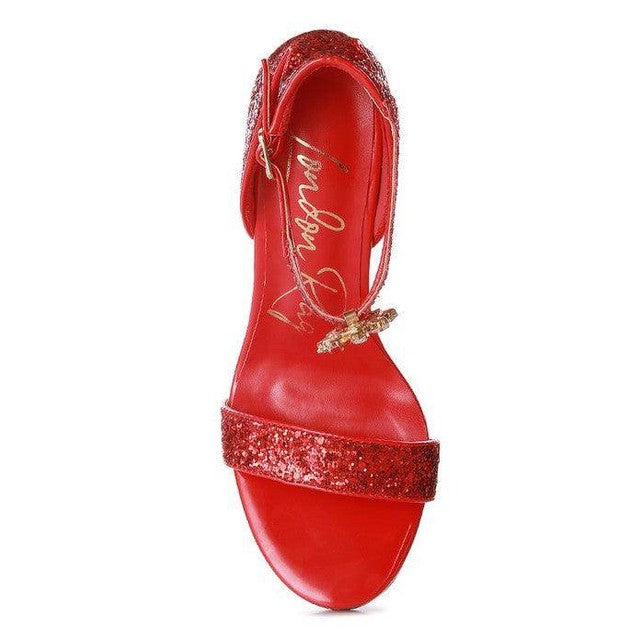 Elegant red high heel sandals with glitter detailing for stylish women