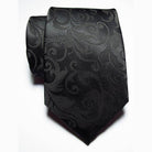 Luxury black silk tie with an elegant pattern for formal occasions by VacationGrabs