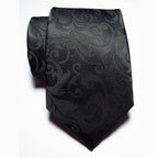 Luxury black silk tie with an elegant pattern for formal occasions by VacationGrabs