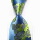 Luxury silk necktie set featuring a vibrant blue and green floral design for stylish men's accessories