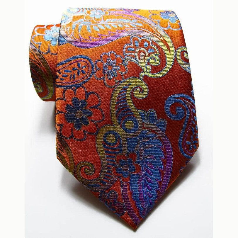 Luxury silk necktie set featuring vibrant orange design with floral patterns and rich colors
