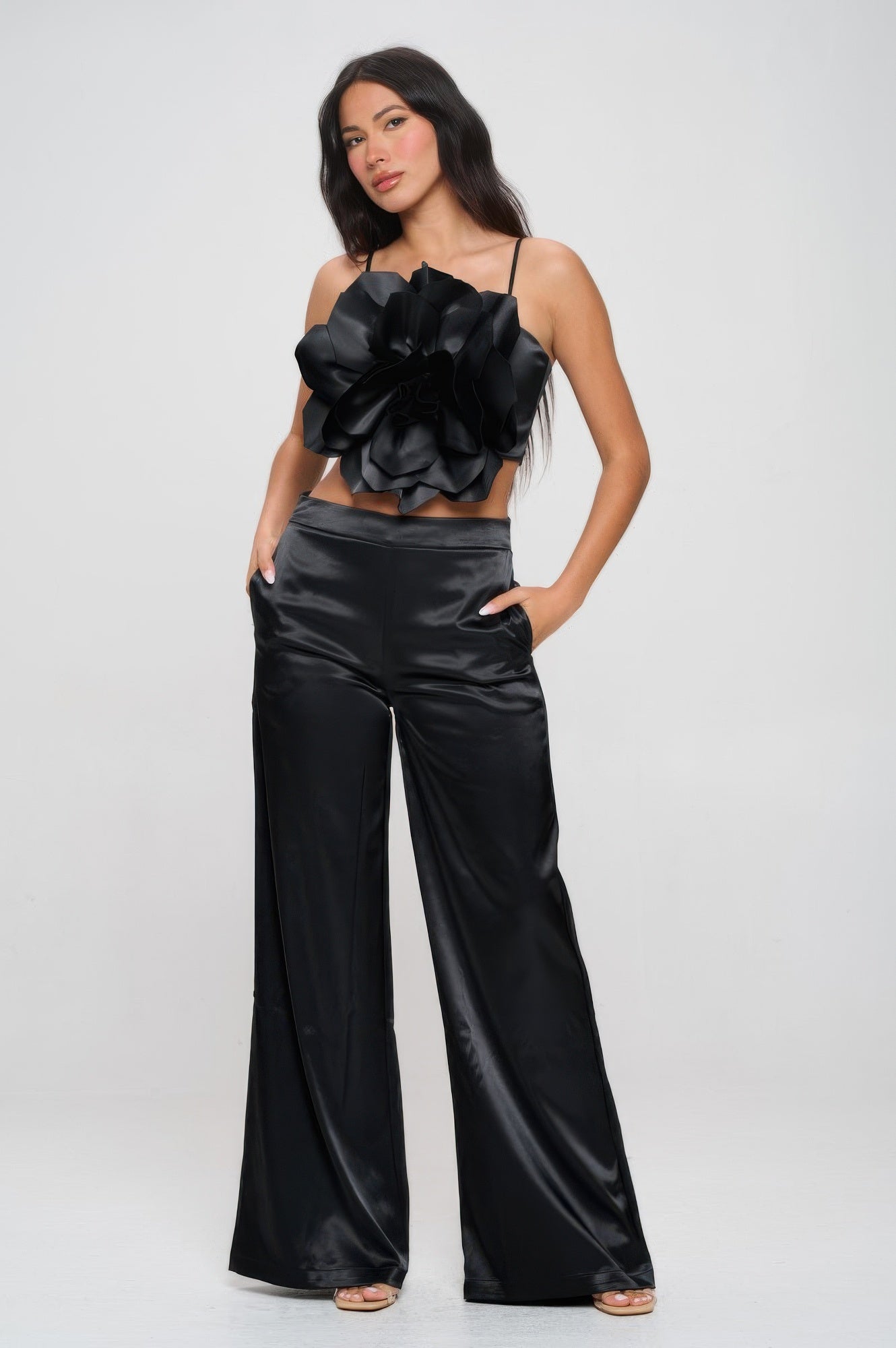 Black satin women's outfit with large flower top and wide leg pants vacation outfit for women